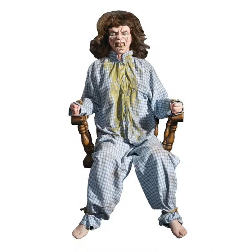 Action figure of a character in checkered outfit with a white background