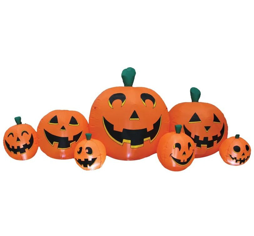 Set of inflatable pumpkins with jack-o'-lantern faces on a white background