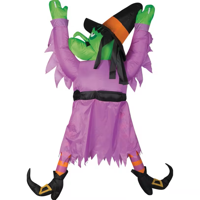 Halloween inflatable witch costume with purple dress, green face, and black shoes on a white background