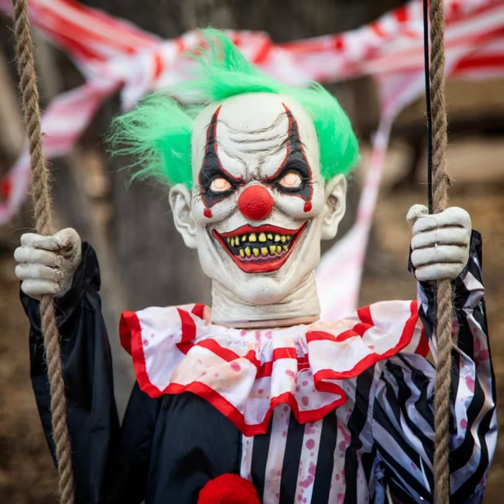 Animated Swinging Chuckles Clown with Light-Up Eyes and Sound