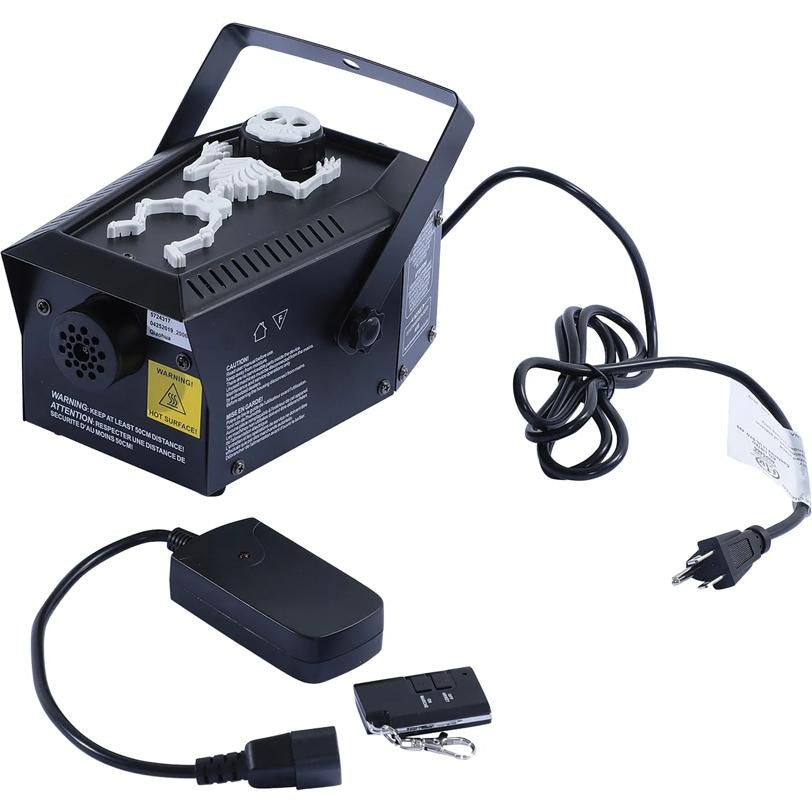Black fog machine with remote control and power cord on a white background